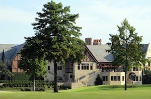 Large building with trees and big yard